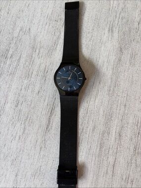 Skagen Black Mesh Watch with Blue Dial 9 inches long.